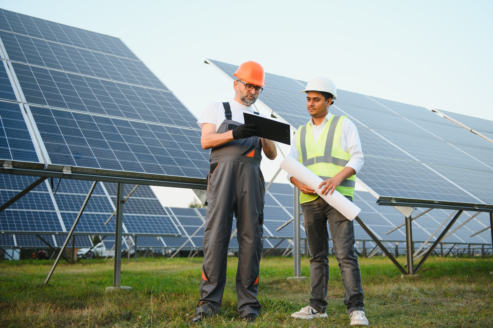 two-engineers-currently-working-on-plans-to-install-solar-panels-at-renewable-solar-power-plants-.jpg